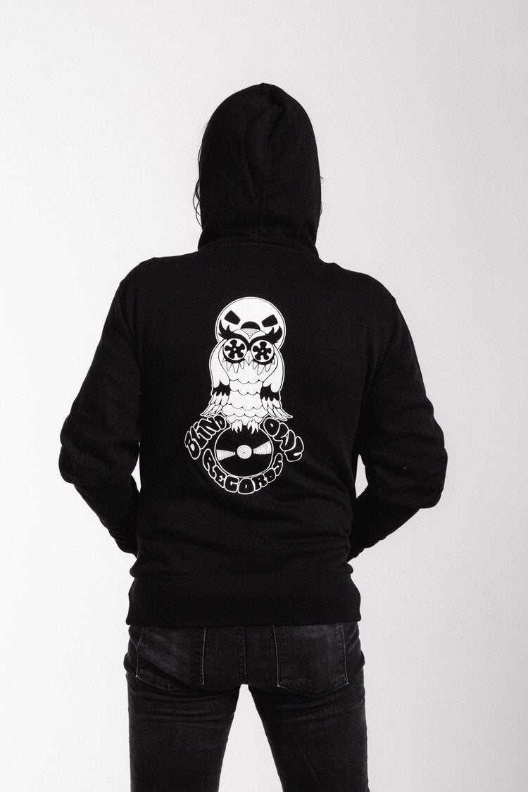 Blind Owl Records black hoodie back with large owl and vinyl design in white, artwork by Roy G Biv