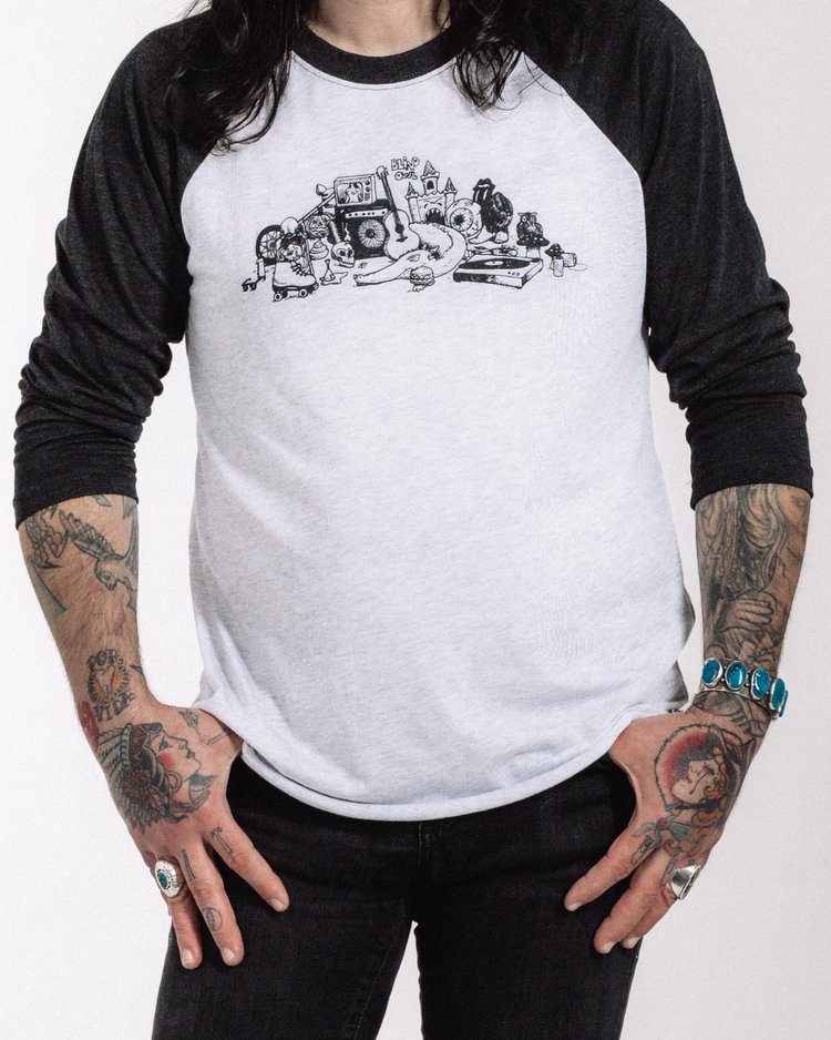 lind Owl Records raglan t-shirt with Roy G Biv artwork inspired by R. Crumb, black sleeves and white body