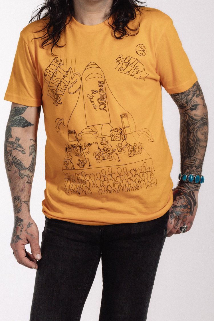 Mrs. Henry 2017 Last Waltz t-shirt in golden yellow with Dani Knapp artwork