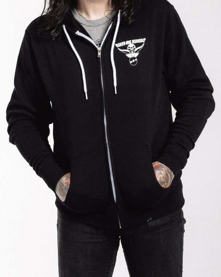 Blind Owl Records black zip-up hoodie with white owl logo on chest, artwork by Roy G Biv