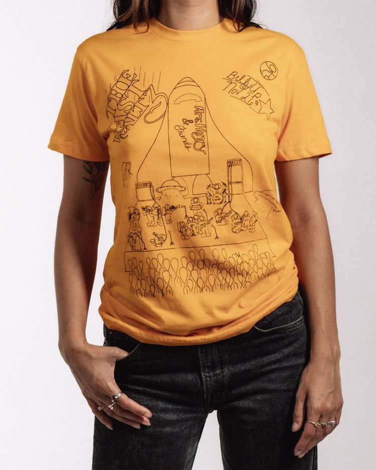 Mrs. Henry 2017 Last Waltz t-shirt in golden yellow with Dani Knapp artwork